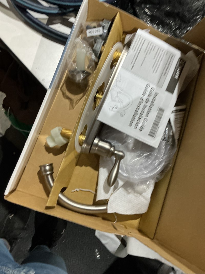 Condition photo showing As Is for moen caldwell spot resist stainless single handle kitchen faucet with sprayer (deck plate and side spray included)