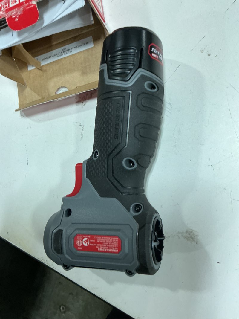 Condition photo showing As Is for hyper tough 12v 180-mph cordless blower with usb-c charging cable