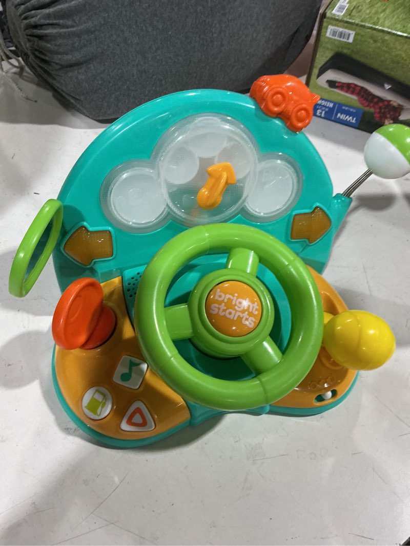 Condition photo showing As Is for bright starts lights & colors driver steering wheel baby toy