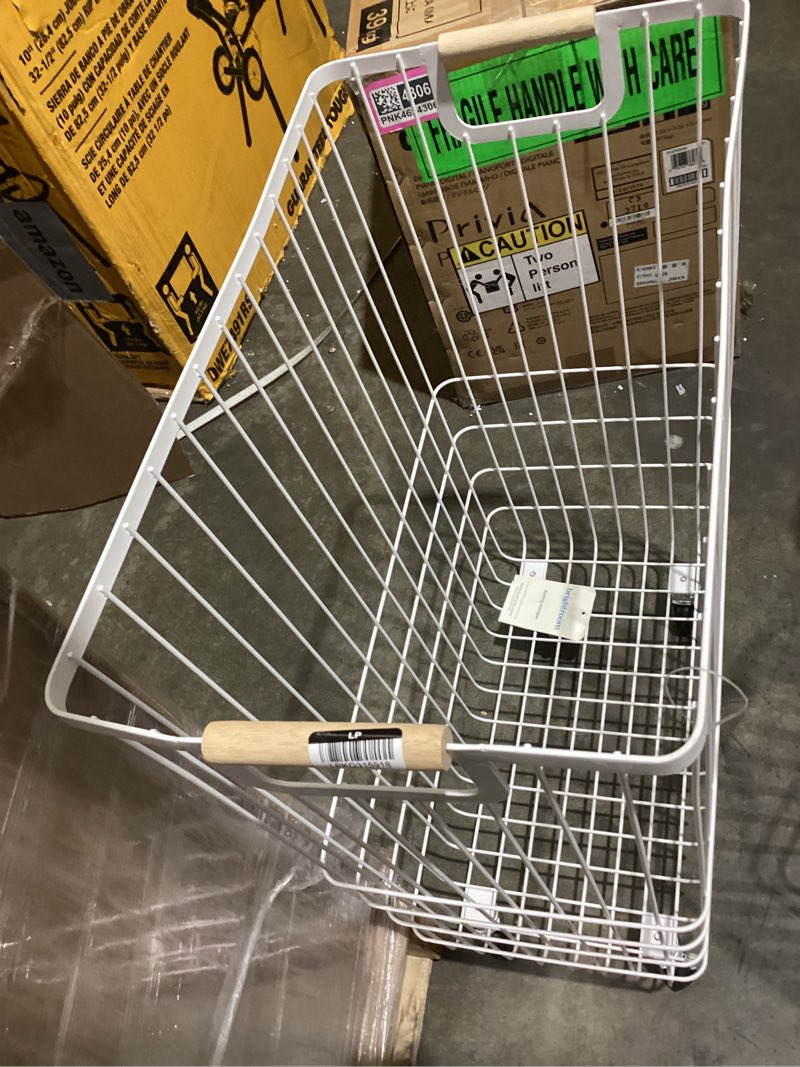 Condition photo showing As Is for missing one wheel *wire rolling laundry hamper - brightroom™
