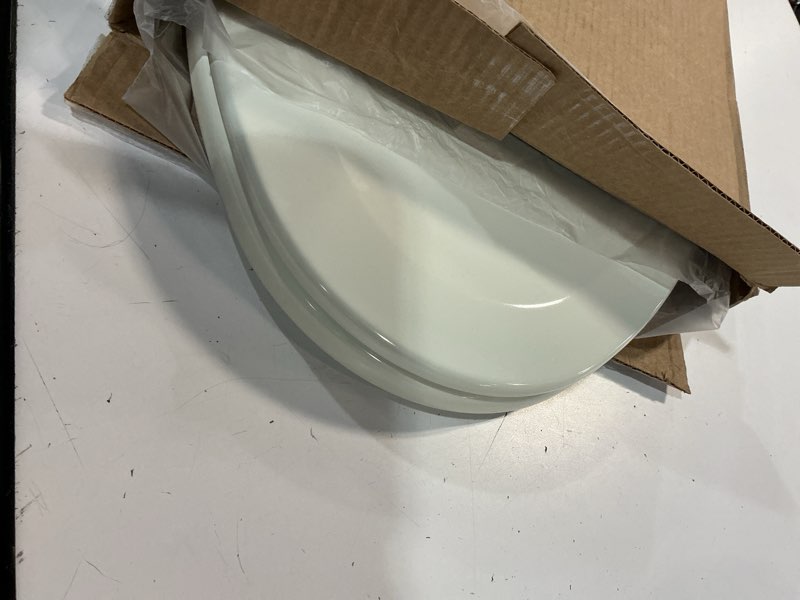 Condition photo showing As Is for bemis elongated enameled wood toilet seat in biscuit with easy•clean? hinge