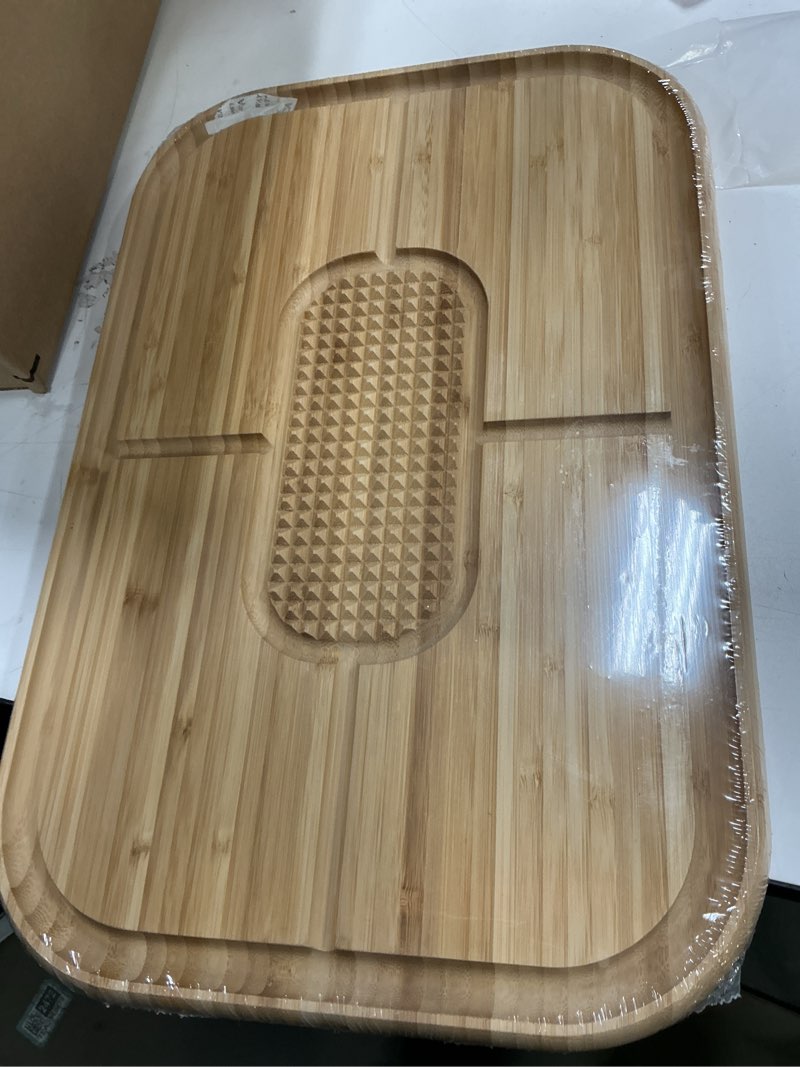 Condition photo showing New/Like New for Turkey Platter for Thanksgiving - 18x12 Reversible Bamboo Carving Cutting Board for BBQ or Grilling - Heavy Duty Butcher Block with Deep Juice Groove, Spikes, Grid Grip - Large Kitchen Christmas Gift