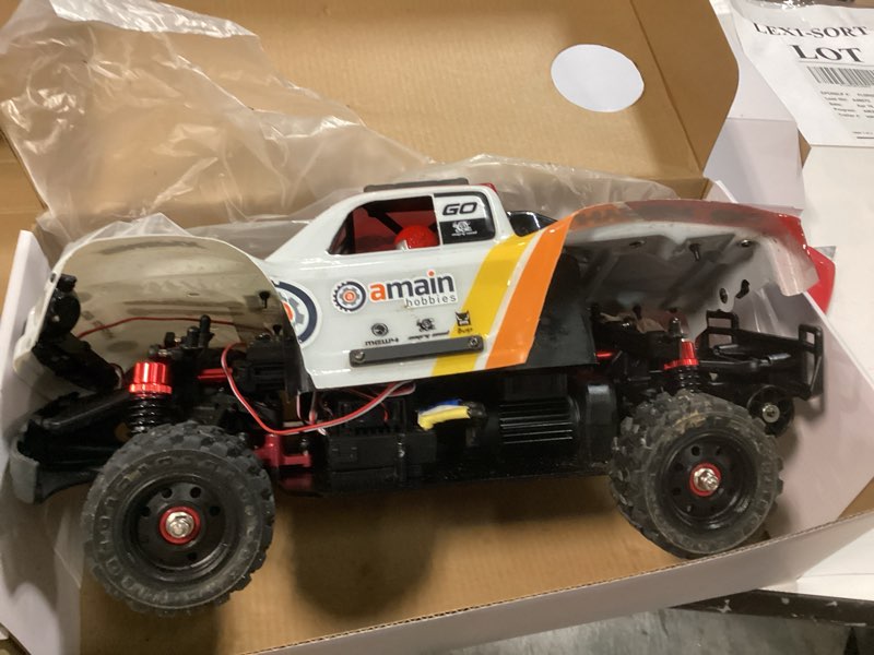 Condition photo showing As Is for mjx hyper go 14211 1/14 brushless 4x4 rc desert trucks with gyro, rtr all terrain short course truck, max 45mph fast rc cars for adults, electric powered 2 of 2000 mah rc car for adult