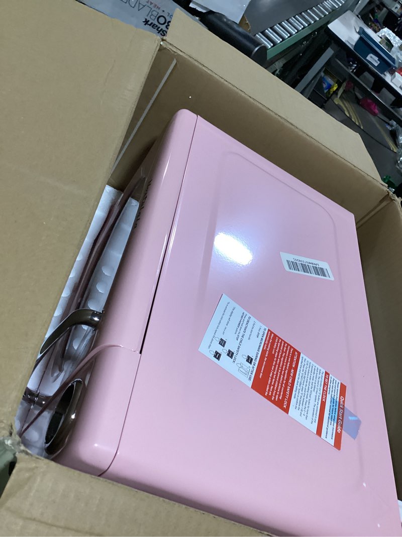 Condition photo showing As Is for Nostalgia Retro Microwave Oven - 0.7 Cu Ft, 700-Watt Countertop Size with Glass Turntable, Child Safety Lock, 8 Auto-Cook Programs, Digital Clock - Pink Retro 0.7 Cu. Ft. Pink