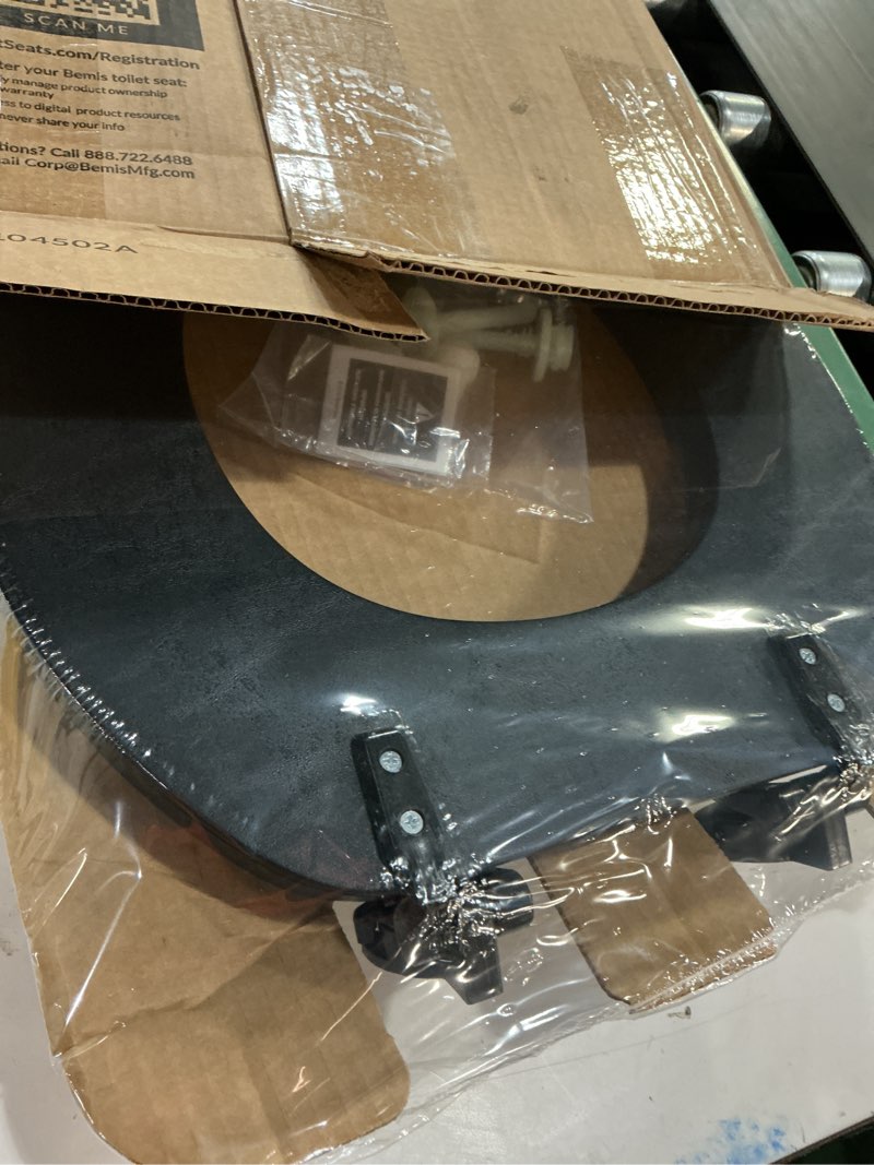 Condition photo showing New/Like New for mayfair padded toilet seat, cushioned soft vinyl over wood core seat, secure hinges, easy clean, made in usa, round, black round black toilet seat