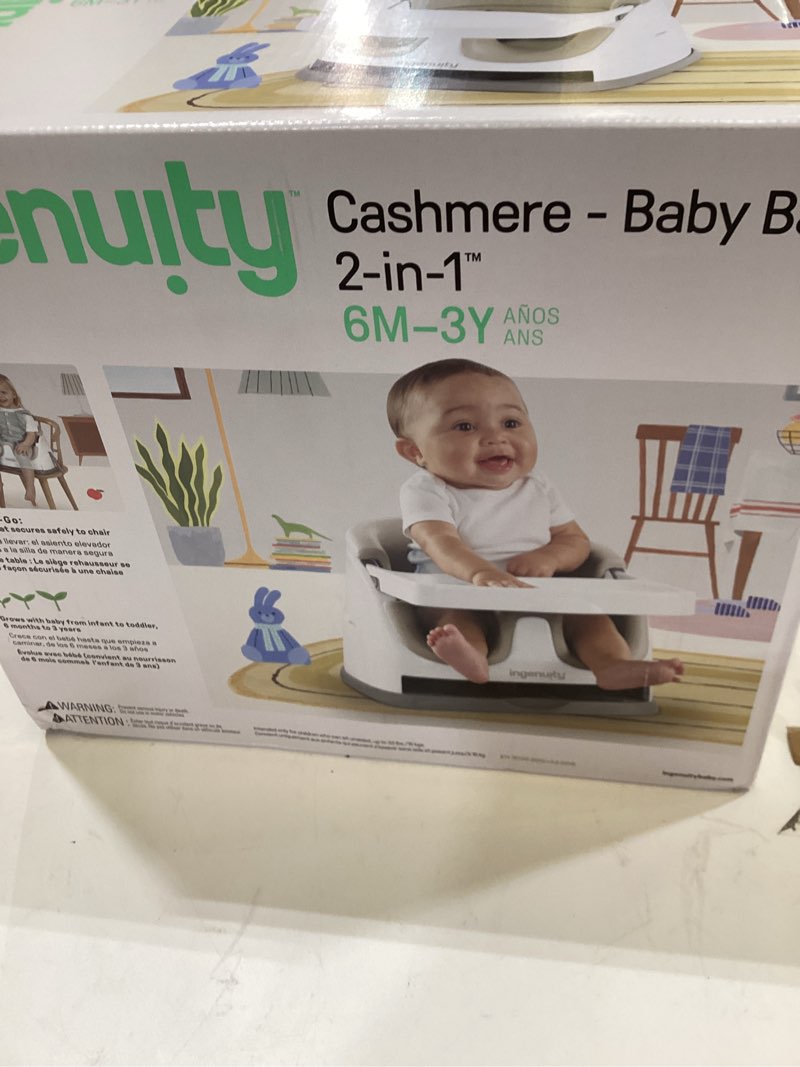 Condition photo showing New/Like New for Ingenuity Baby Base 2-in-1 Booster Feeding and Floor Seat with Self-Storing Tray - Cashmere