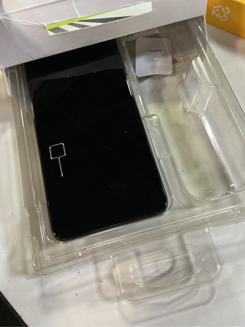 Condition photo showing As Is for straight talk tcl k33, 5g, 64gb, gray - prepaid smartphone [locked to straight talk].   *** working condition verified. no network or connectivity tests were performed. bidder be advised ***