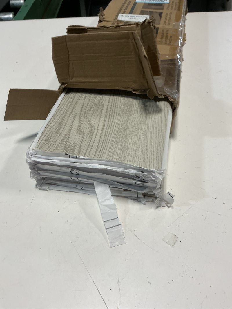 Condition photo showing New/Like New for art3d 36-pack peel and stick luxury vinyl flooring tiles, 54 sq. ft self adhesive wood plank for kitchen, bedroom, bathroom, grey ash 36 x 6 x 0.1 inches grey ash 36