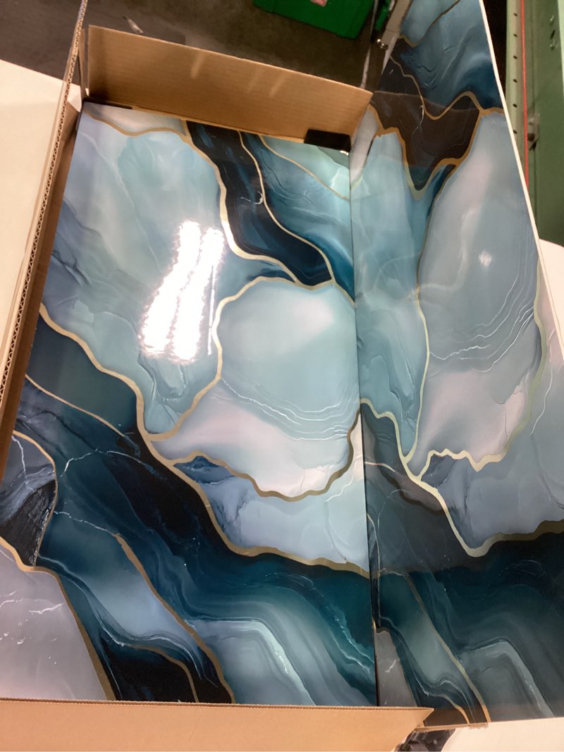 Condition photo showing Good Condition for Haimin Wall Panels Peel and Stick 10 Pieces 23.6x11.8in (19.4 Sq. Ft. Coverage) Lightweight Backsplash Marble Look Tile (not Real Marble) Ideal for Kitchen Bathrooms Living Rooms Bedrooms Blue Gold-010