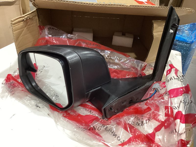 Condition photo showing As Is for rear view mirror, vehicle model unknown