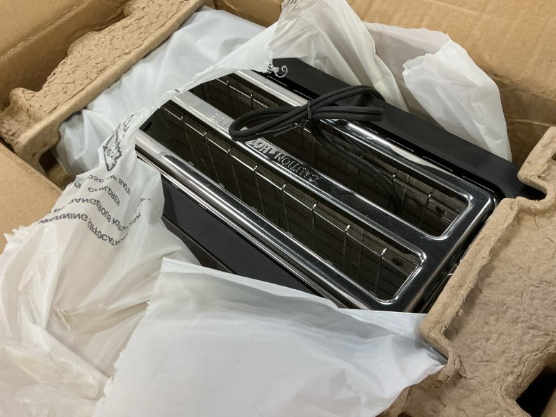 Condition photo showing Good Condition for elite gourmet ect-3100 long slot 4 slice toaster, reheat, 6 toast settings, defrost, cancel functions, built-in warming rack, extra wide slots for bagels & waffles, stainless steel & black 4 slice matte black