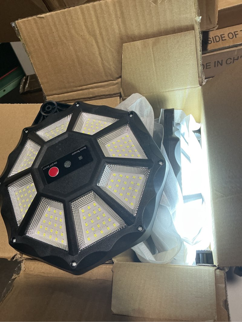 Condition photo showing Good Condition for Solar Lights Outdoor, 168LED 6500K Flood Light Dusk to Dawn, 8 Sides Solar Outdoor Lights with Motion Sensor, IP66 Waterproof Solar Street Lights Outdoor for Yard, Pools(4 Pack) 6500K 4PCS