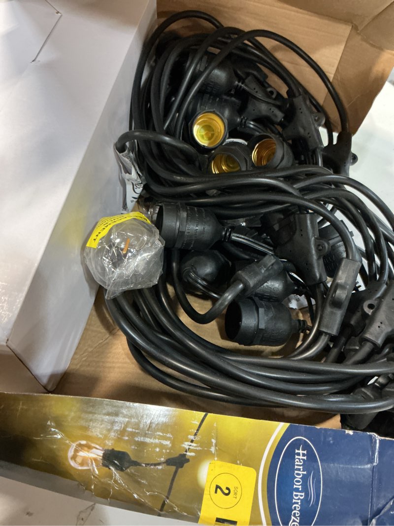 Condition photo showing As Is for harbor breeze 48-ft plug-in black indoor/outdoor string light with 24 white -light led edison bulbs