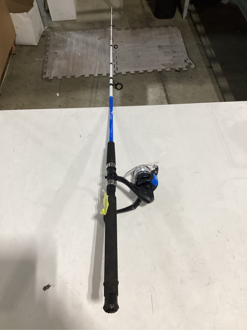 Condition photo showing Good Condition for shakespeare tiger spinning surf mossy oak combo, 9' rod and reel combo