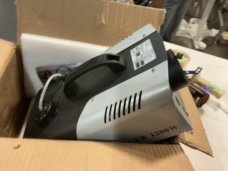 Condition photo showing As Is for 1200W RGB Fog Machine, 6 Colorful LED Lights for Smoke Machine Indoor/Outdoor Use, Perfect for Parties, Weddings, and Stage Effects Silver 1PC 1200W