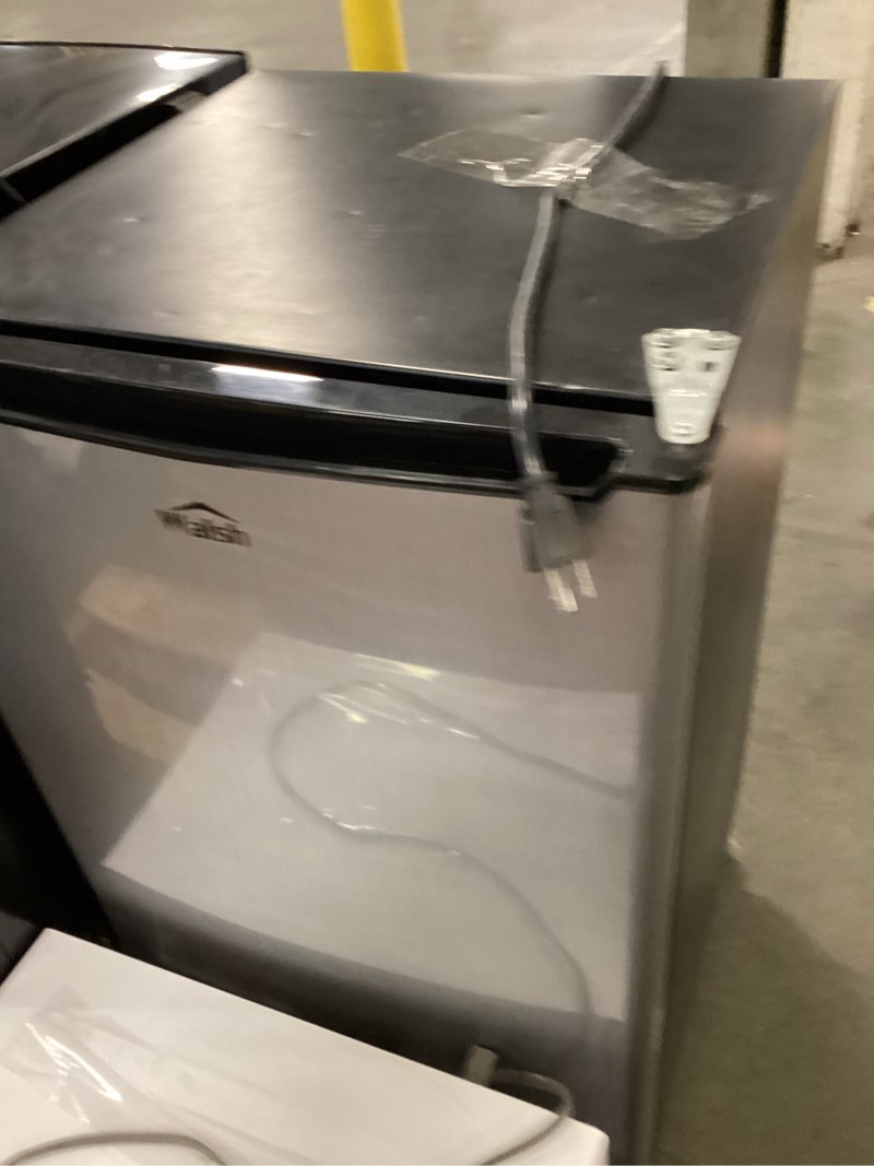 Condition photo showing As Is for Whirlpool Mini Refrigerator 2.7 Cubic Feet WH27S1E Used During 1 Year