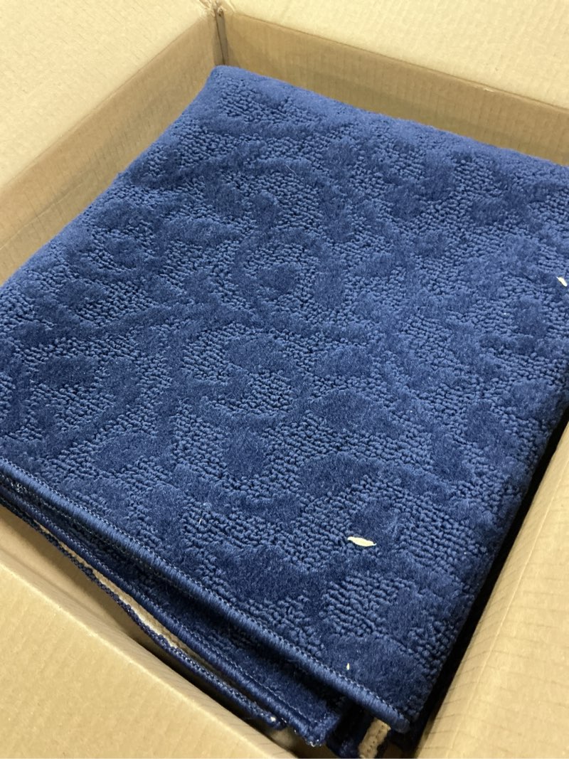 Condition photo showing Good Condition for garland rug sparta non slip polypropylene 3 ft. x 5 ft. navy blue area rug- ideal for living rooms & hallways, stylish & durable for high-traffic areas navy 3' x 5' (rectangular)