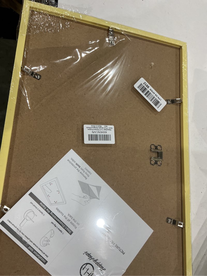 Condition photo showing As Is for happyhapi 11x17 picture frame gold, gold picture frames display photos 9x15 with mat or 11x17 without mat, 1 pack plastic frame for wall for home decor