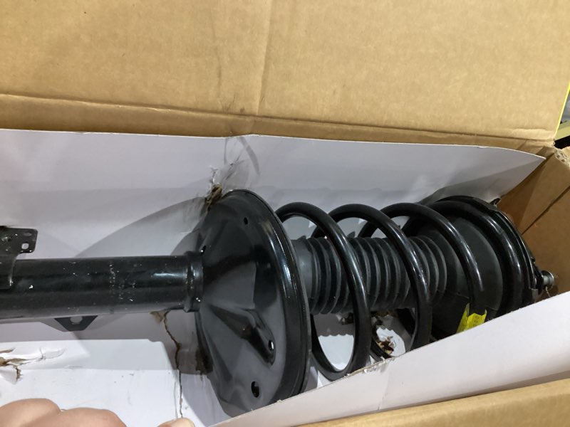 Condition photo showing As Is for monroe quick-strut 171454 suspension strut and coil spring assembly for toyota rav4