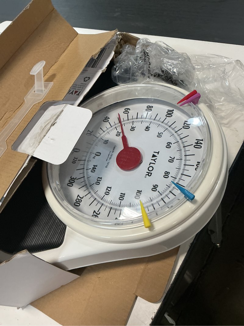 Condition photo showing As Is for taylor analog scales for body weight, rotating dial, 300 lb capacity, black textured mat with durable metal platform, easy to clean, 10.0 x 10.0 inches, black black 300 pound