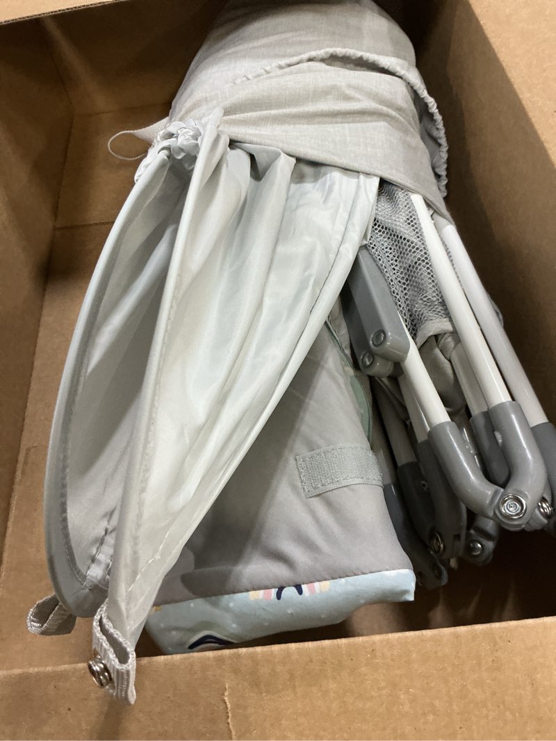 Condition photo showing Good Condition for regalo my play baby portable bassinet with upf 50+ canopy & mosquito net, foldable travel bassinet & playpen, lightweight indoor outdoor baby lounger, mesh sides, toys & padded base, newborn to 15 lbs