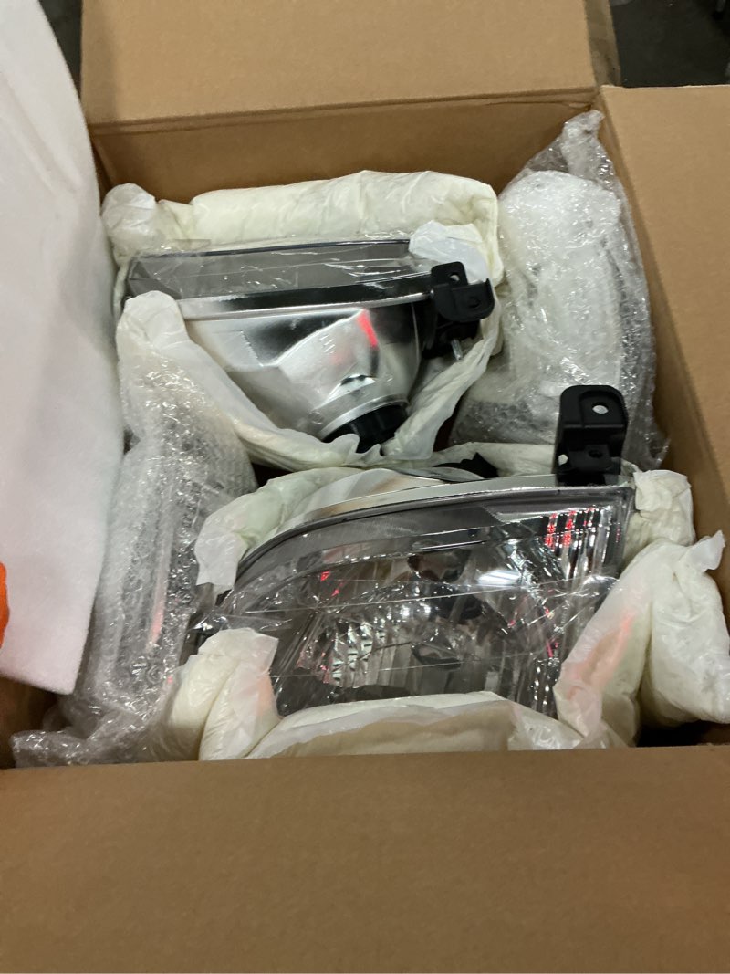 Condition photo showing Good Condition for headlight assembly fit for 2000 2001 2002 2003 2004 toyota tundra headlights + parking lights lamps chrome housing white corner driver and passenger side to2530135 to2531135
