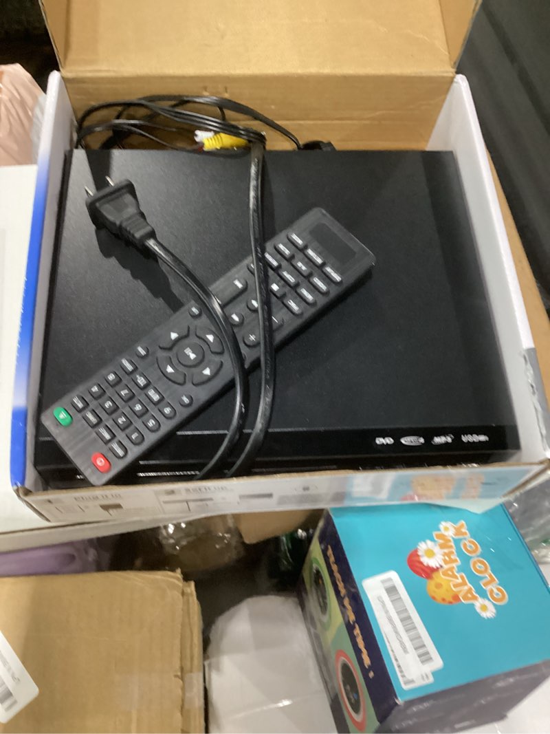 Condition photo showing As Is for dvd player, region free dvd players for cd/dvd's, compact dvd player supports ntsc/pal system with rca stable outputs/usb 128g input, contains remote control and rca cable-not support hdmi