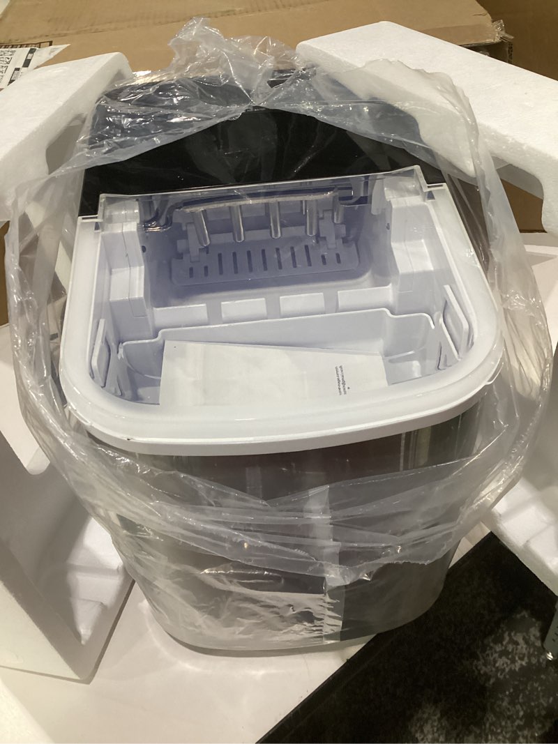 Condition photo showing Good Condition for (used, not tested)38lbs per day countertop ice maker, 9 ice cubes in 3.5 minutes, self-cleaning portable ice machine with 2 bullet sizes for kitchen, camping, rv, and partye