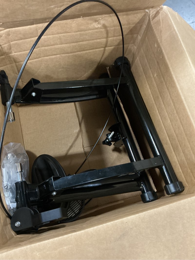 Condition photo showing As Is for bike trainer, magnetic bicycle stationary stand for indoor exercise riding, 26-29" & 700c wheels, quick release skewer & front wheel riser block included black