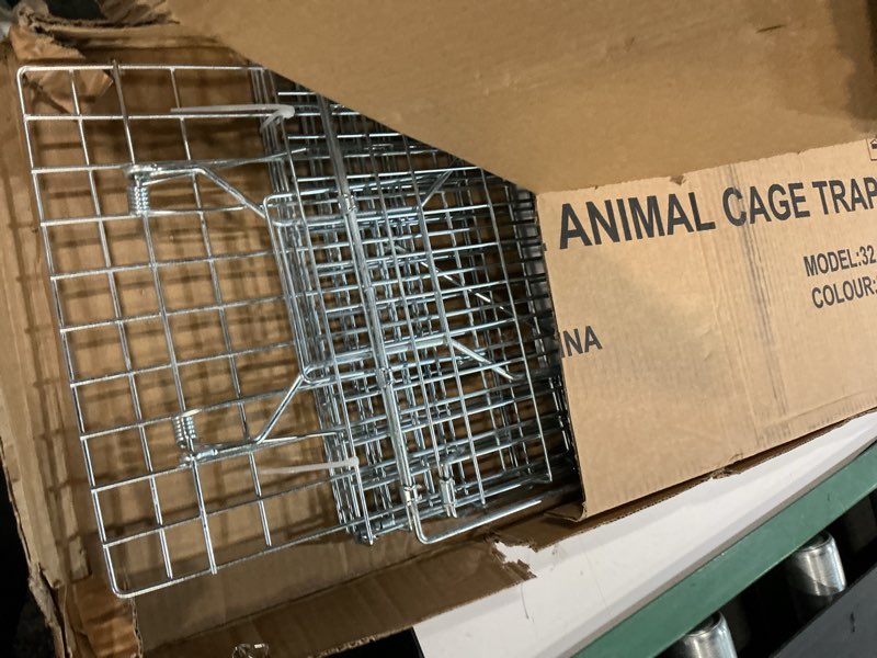 Condition photo showing As Is for 32” humane animal trap, live animal trap cage for stray cats, raccoons, squirrels, rabbits, moles, groundhogs, armadillos up to 16.5 lbs, galvanized rustproof live animal cage trap