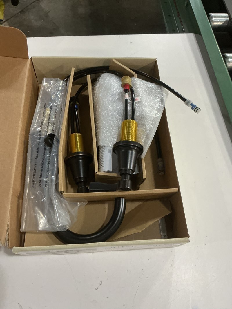 Condition photo showing As Is for  bought last week allen + roth townley oil rubbed bronze widespread 2-handle watersense high-arc