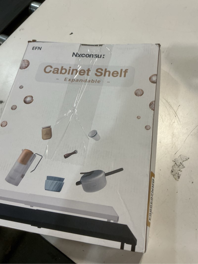 Condition photo showing New/Like New for nxconsu cabinet shelf expandable organizer riser rack for kitchen pantry cupboard under sink countertop home organization extra storage space saver heavy duty metal edgeless design white large white 10’’d * 14.56-24.6’’w * 8.46’’h