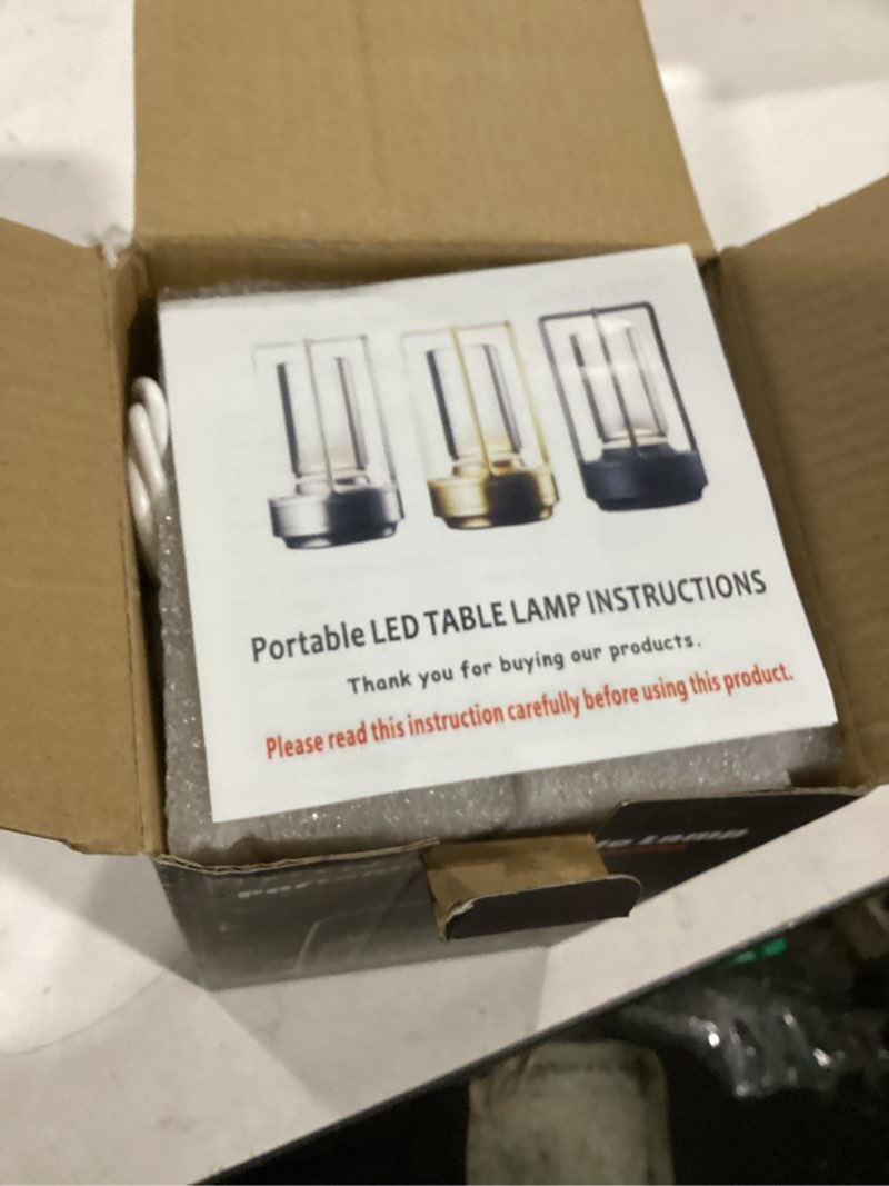 Condition photo showing Good Condition for portable metal table lamp for indoor/outdoor ,rechargeable cordless led lamp, 3-colour infinitely dimming battery powered small desk lamp, restaurant/bedroom/bar/coffee shop/camping light (black)