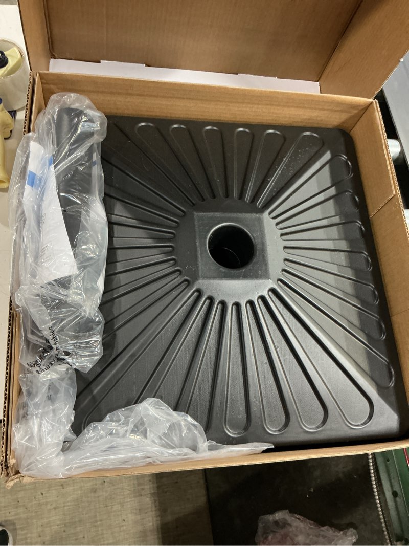 Condition photo showing As Is for better homes & gardens 50lb square outdoor fillable wheeled umbrella base, black