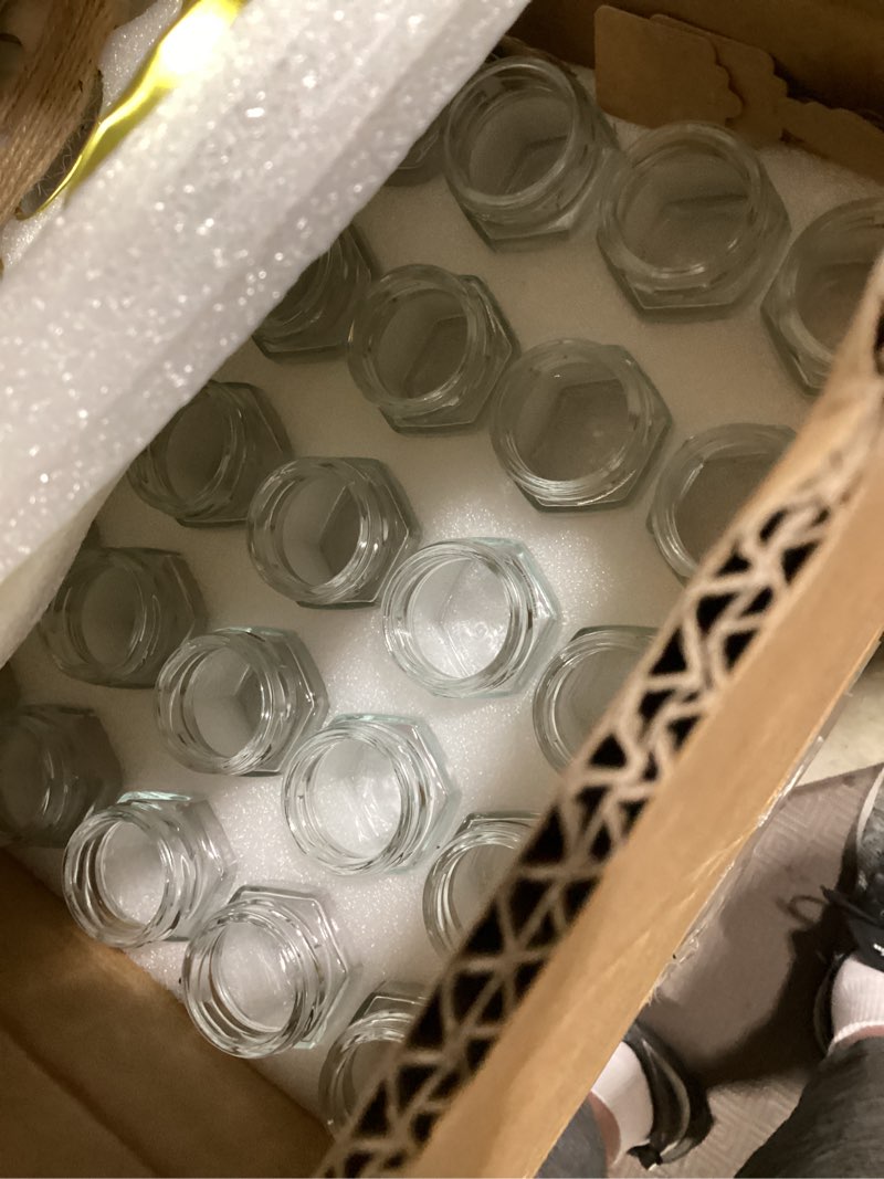 Condition photo showing As Is for missing lid 1.5 oz clear hexagon jars,small glass honey jars with lids(golden),mason jars for herbs,foods,jams, liquid,party favor,mini spice jars for storage 30 pack 1.5oz-30pack
