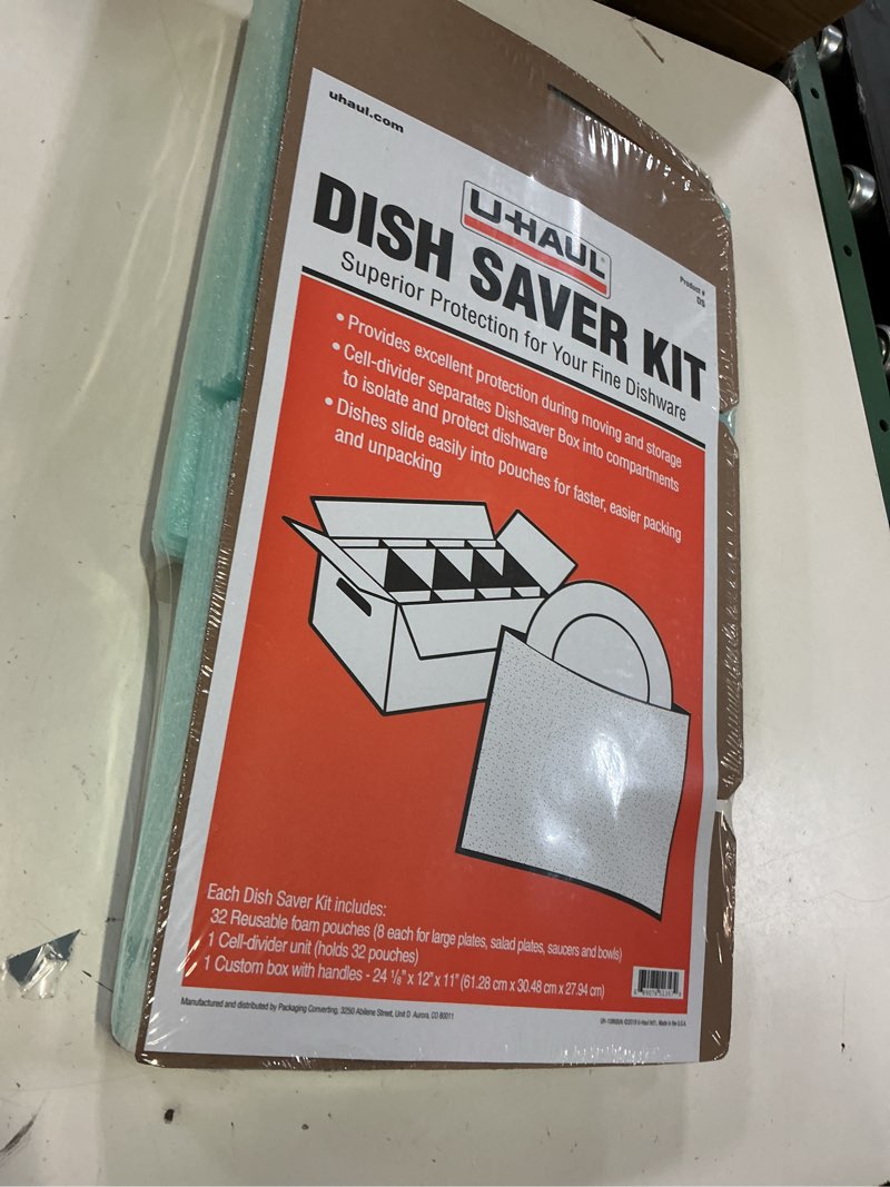 Condition photo showing New/Like New for u-haul dish packing kit – for dishes and glassware – includes 1 box, 1 cell divider unit, and 32 assorted foam pouches