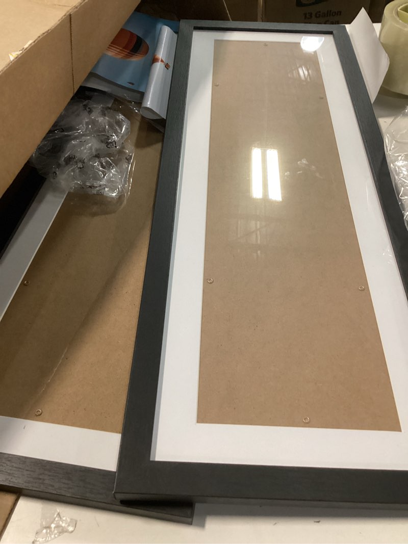 Condition photo showing As Is for JCJMY 8x24 Picture Frame Set of 2 with 6x22 Mat, Panoramic Picture Frame Display Photo 6x22 with Mat or 8 x 24 Without Mat, Wall Hanging Large 8 by 24 Poster Frame with Plexiglass, 2 Pack, Black Black, 2 Pack 8x24 inch