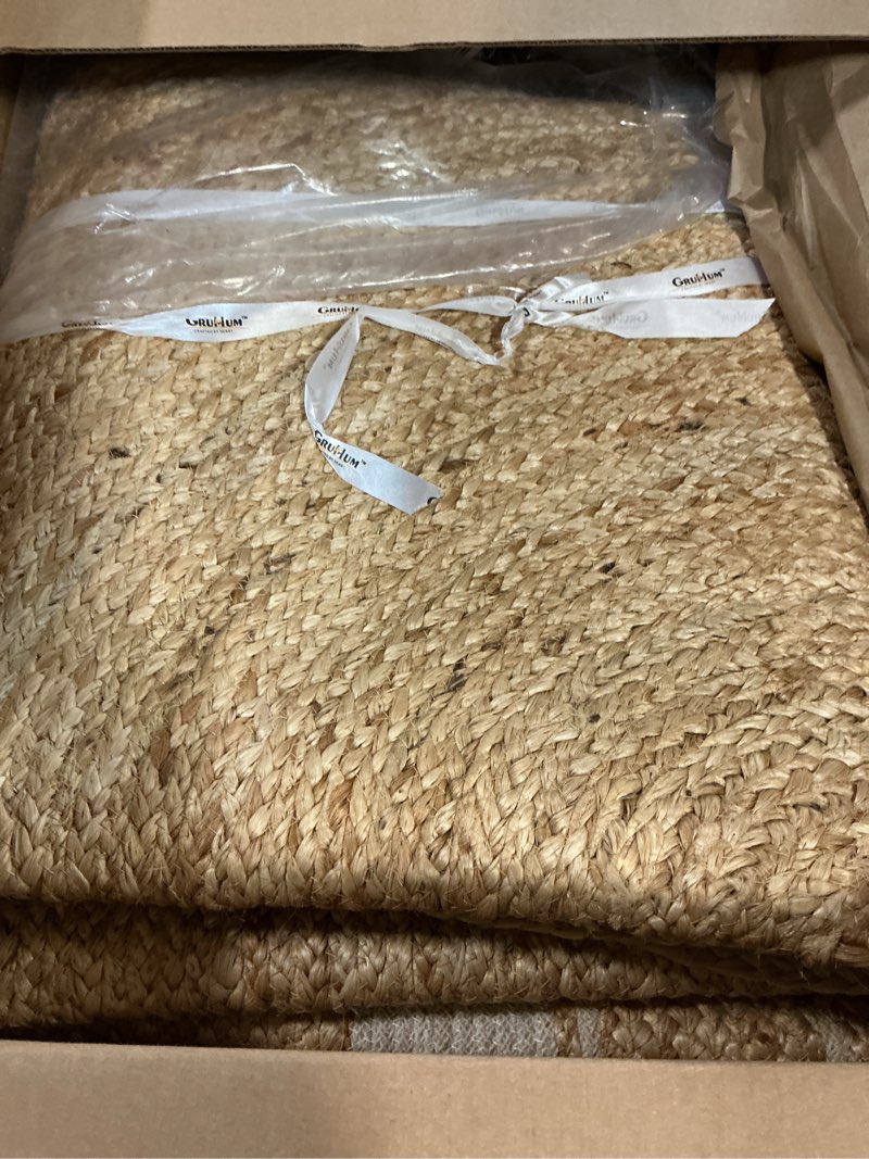 Condition photo showing Good Condition for GRUHUM 6' ft Round Jute Cotton Area Rug - Natural Fiber Handmade Boho Charm Farmhouse Jute Area Rug Soft Braided Rustic Vintage Reversible Indoor Outdoor Kitchen Bedroom Living Room Hallways Enterway 6' (Round) Natural- 14