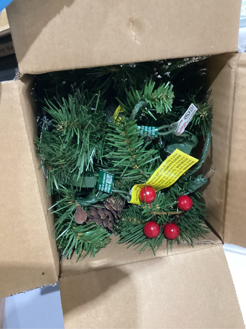 Condition photo showing Good Condition for national tree company 9 ft pre-lit crestwood spruce artificial christmas garland, christmas decoration with glitter, pinecones, red berries, 50 clear lights, 180 tips, green plug in tree