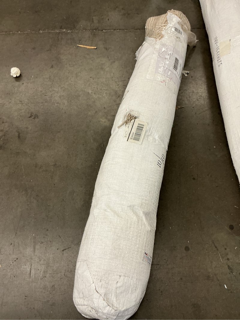 Condition photo showing As Is for woven natural and cream colored area rug 5’