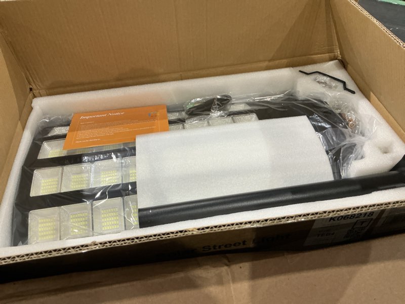 Condition photo showing New/Like New for solar street light 2 pack, 9000w solar street lights outdoor waterproof, solar parking lot lights with remote control & motion sensor, pole or wall mount, for commercial yard driveway barn