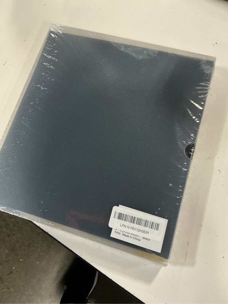 Condition photo showing New/Like New for wedding guest book with photo booth insert - 160 2x6 photo sleeves & guest signing space, pu leather memory album for weddings, parties, family memories (black)
