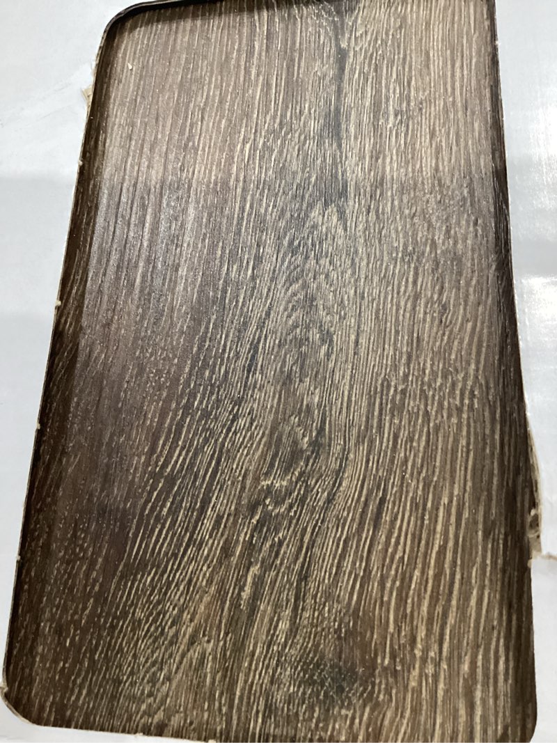 Condition photo showing Good Condition for style selections tudor oak brown 12-mil x 7-in w x 48-in l waterproof interlocking luxury vinyl plank flooring (23.21-sq ft/ carton)