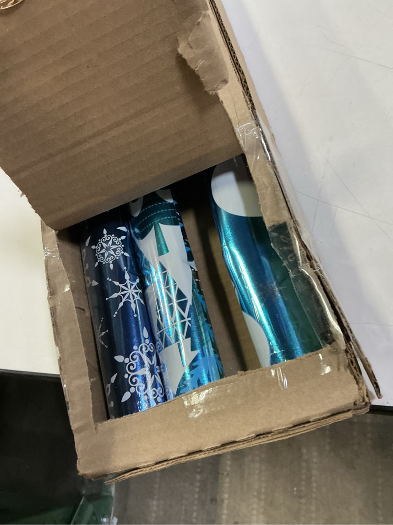 Condition photo showing New/Like New for Hallmark Blue Foil Christmas Wrapping Paper with Cut Lines on Reverse (3 Rolls: 60 sq. ft. ttl) Snowmen, Snowflakes, Christmas Trees Blue Snowman, Snowflakes, Trees