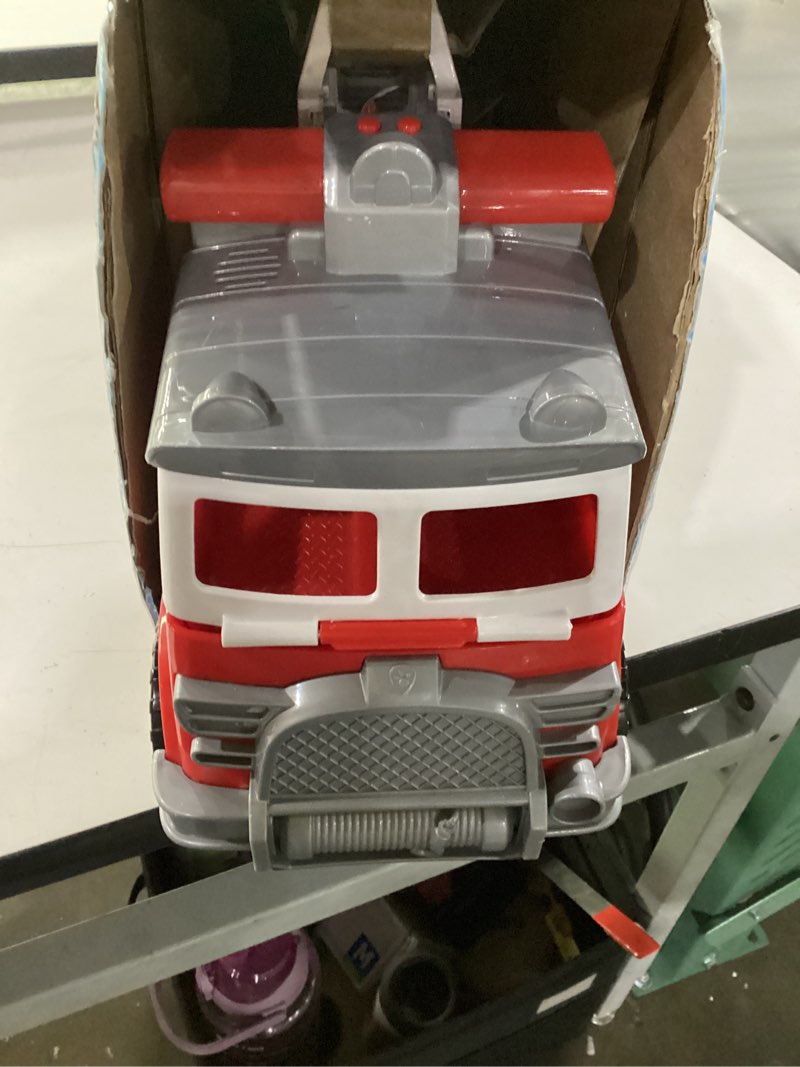 Condition photo showing Good Condition for paw patrol ultimate rescue fire truck with 2 ft. ladder, lights, sounds, a mini toy car, chase, marshall & skye figures, toys for boys & girls ages 3+ ultimate firetruck
