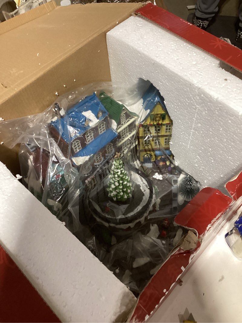 Condition photo showing As Is for Christmas Village House, 12.4" H Large Size, Colourful LED Lights with Christmas Music, Rotating Christmas Trees and Roller Skaters, Christmas Decoration for Home (Yellow) 24-villagetree