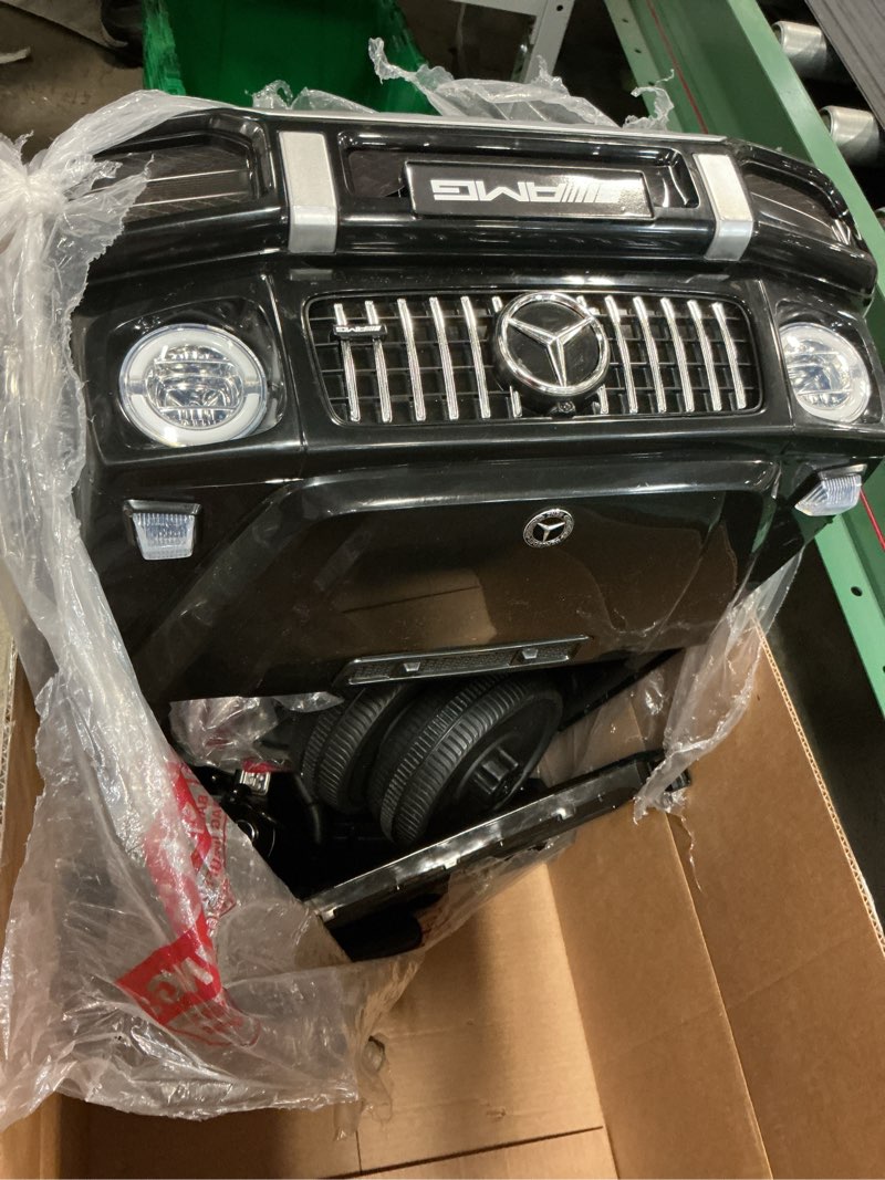 Condition photo showing As Is for elemara licensed mercedes-benz amg g63 ride on toys,12v ride on car with remote control,rechargeable battery,flickering lights/led lights, bluetooth,music & horn, soft start, low battery prompt,black