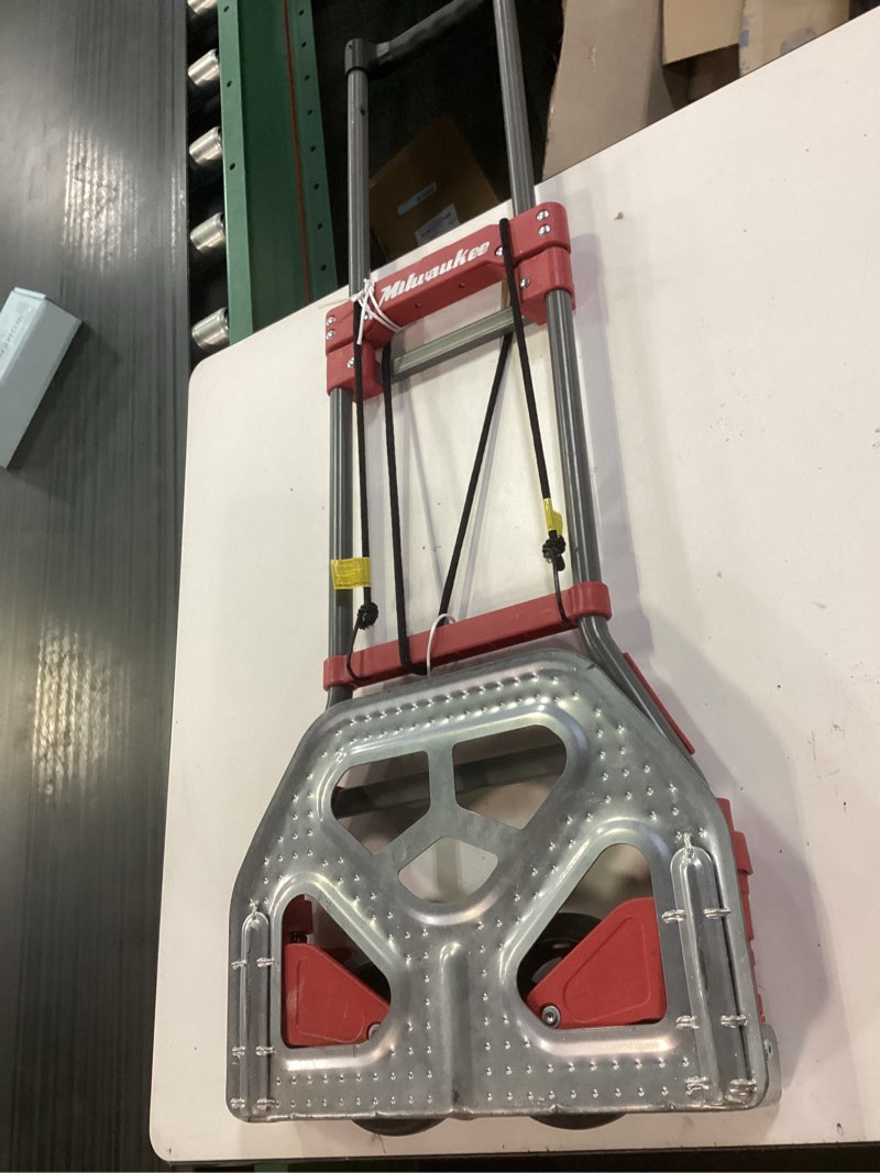 Condition photo showing As Is for milwaukee 73777 lightweight collapsible folding hand truck 150 lbs. capacity