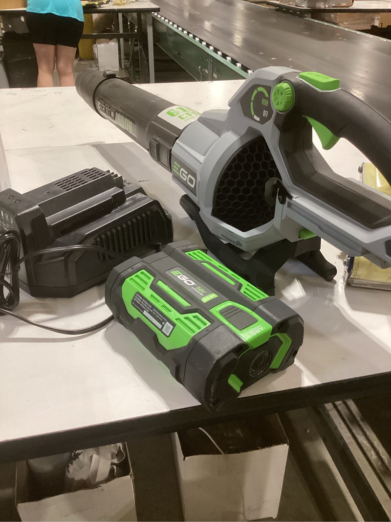 Condition photo showing As Is for ego power+ 56-volt 615-cfm 170-mph battery handheld leaf blower 2.5 ah battery included charger included