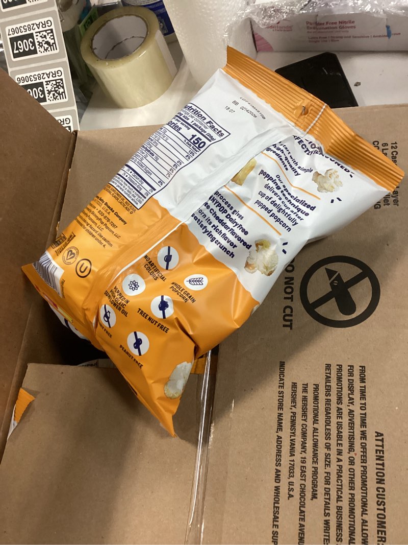 Condition photo showing New/Like New for Exp 02/14/26 12Pc WHITE CHEDDAR POPCORN, WHITE CHEDDAR